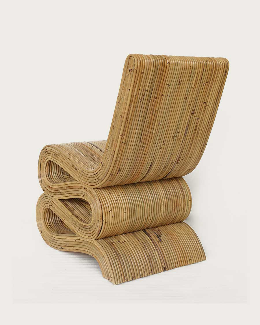 Diu - Fauteuil design en rotin tressé